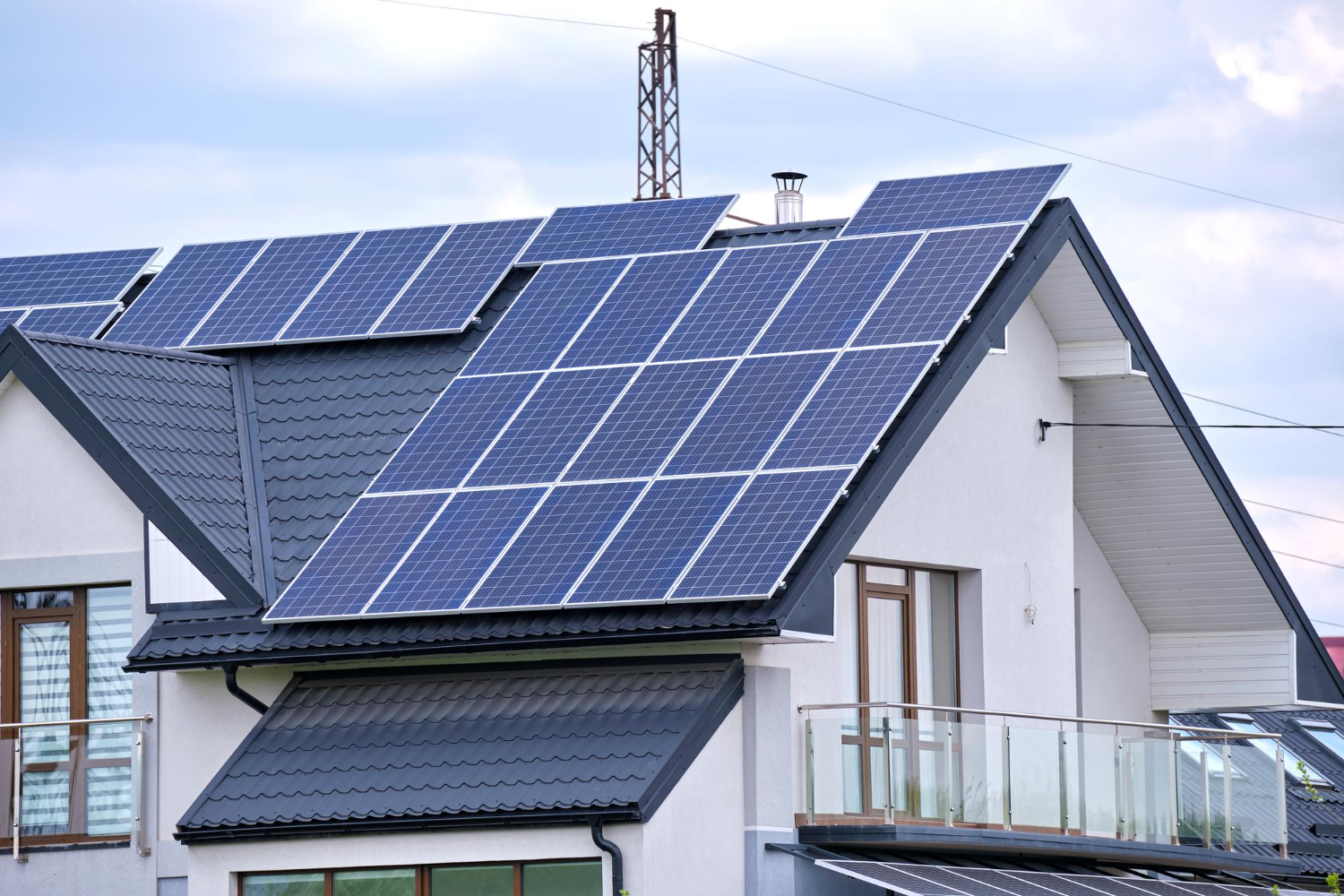 residential house with rooftop covered with solar photovoltaic panels producing clean ecological electrical energy suburban rural area concept autonomous home